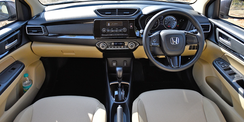 Enjoy the smart dashboard, legroom, and sheer comfort facility in Honda Amaze rental cabin in Kochi.