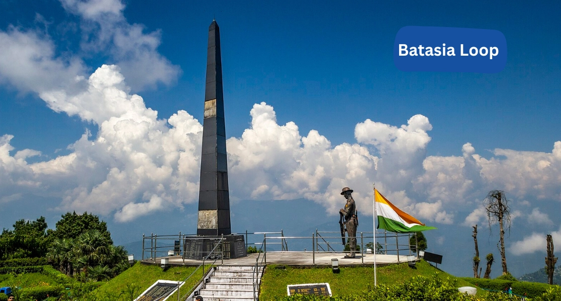 Journey through Batasia Loop with stunning views on Darjeeling Hill Railway from Cochin Tour