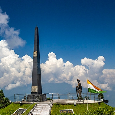 Journey through Batasia Loop with stunning views on Darjeeling Hill Railway from Cochin Tour