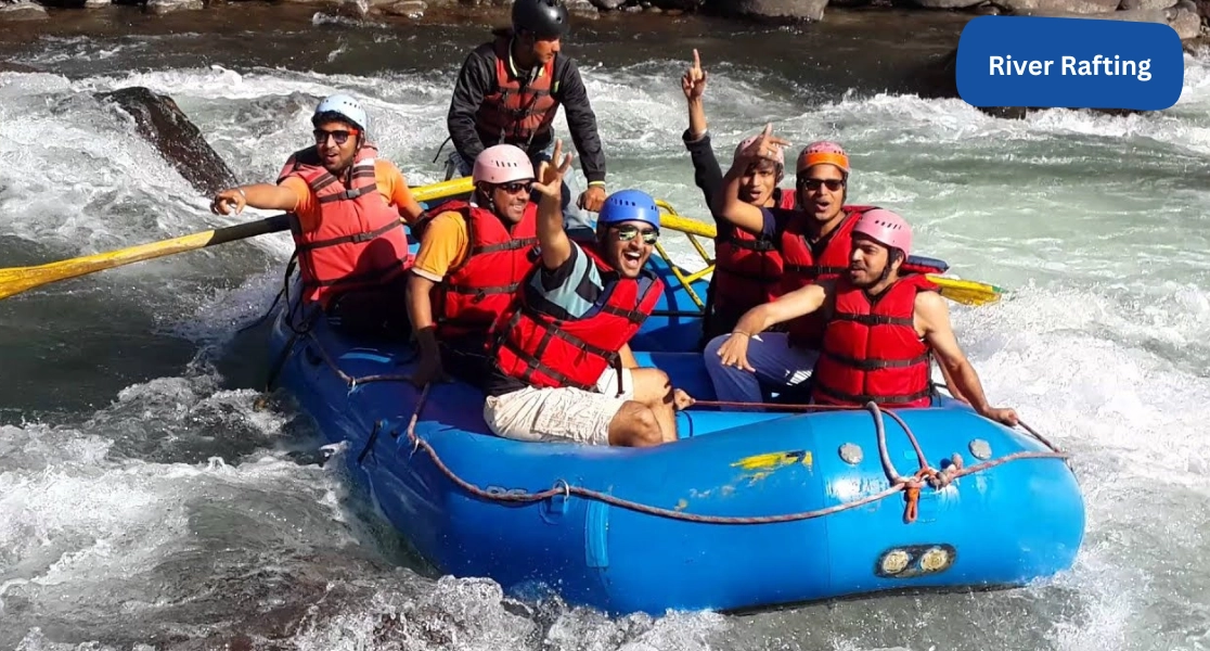 Travelers enjoy river rafting in scenic Shimla-Manali tour packages with beautiful hill views
